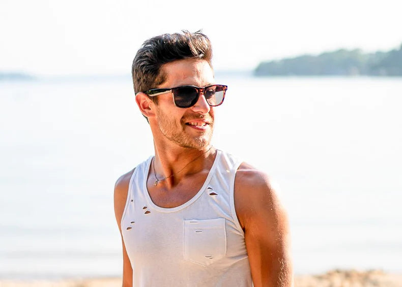 Model wearing Classic 145mm oversize sunglasses in Tortoise – stylish brown frame and polarised lens comfort.