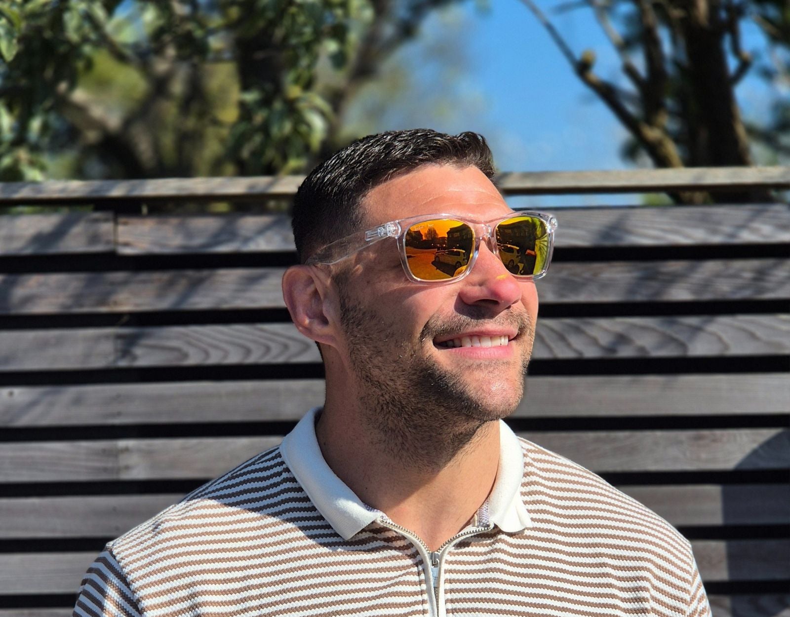 Model wearing Classic 155mm XL extra wide sunglasses in Clear with yellow lenses – bold and comfortable for wide faces.