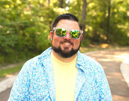 Model wearing Classic 165mm XXL large head sunglasses in Clear with green polarised lenses – oversized comfort with bold green lenses.