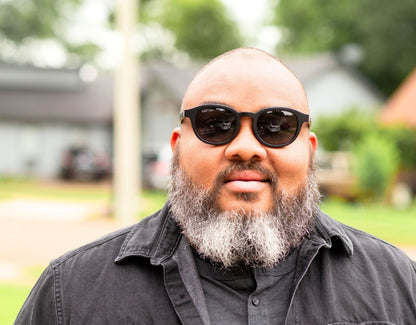 Model wearing The Scholar 165mm XXL large sunglasses in Black – stylish, oversized fit for wide faces and big heads.