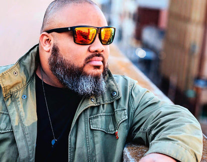 Model wearing Sport 165mm XXL sport sunglasses for wide faces with yellow lenses – bold, bright and built for movement.