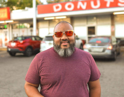 Model wearing Sport 165mm XXL polarised sunglasses in Clear with yellow lenses – wide fit, lightweight frame, bold tone.